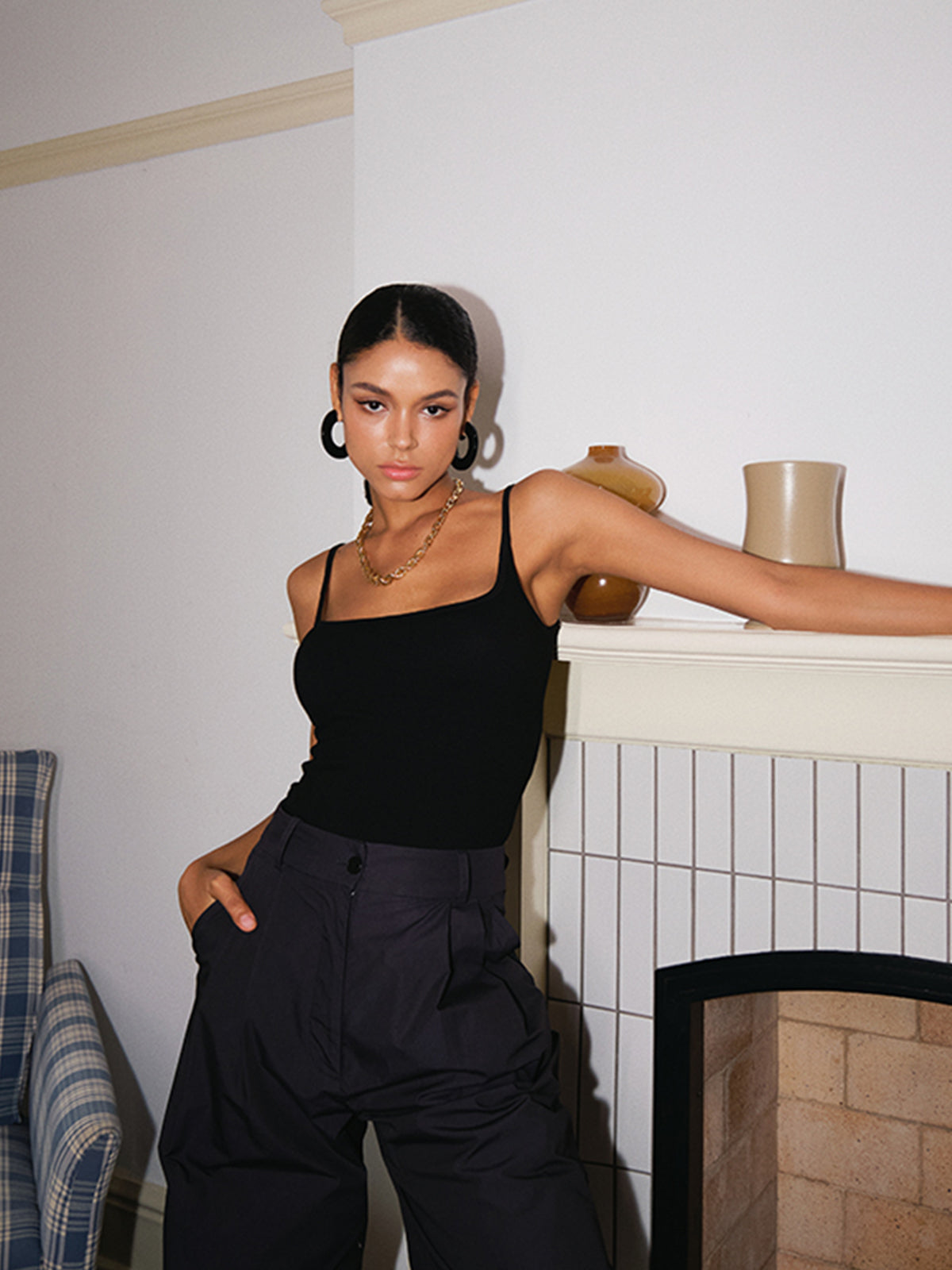 Sleeveless top for women with low neckline